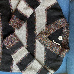 V neck sweater with black & grey vertical stripes, perfect for Christmas